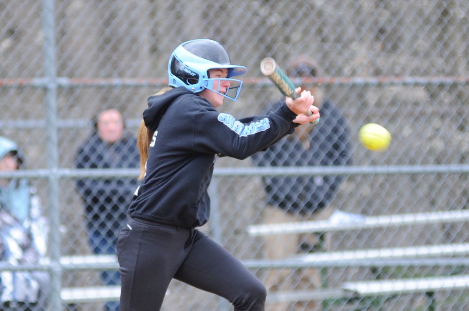 Sullivan West’s Liz Reeves connects on a bunt.